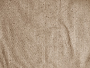 Vintage beige fabric texture, background. Old canvas texture, burlap, sackcloth.
