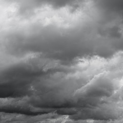 Gloomy cloudy sky. Clouds flying over horizon, cloudscape.