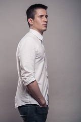 one young man, side view, portrait, upper body, white shirt,