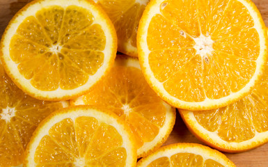 Background of sliced juicy oranges fruit