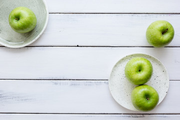 ripe green apples white table background top view space for text