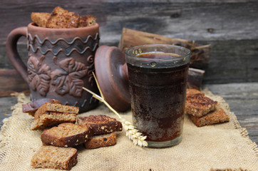 Cold bread kvass on a wooden background
