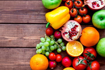 cooking salad with fresh fruits and vegetables on wooden background top view mock-up