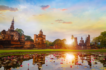 Fototapeta premium Wat Mahathat Temple at Sukhothai Historical Park, a UNESCO World Heritage Site in Thailand