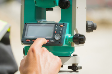 Theodolite instrument for measuring angles in construction industry.