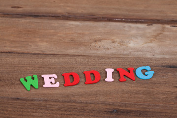color wedding letters on wood