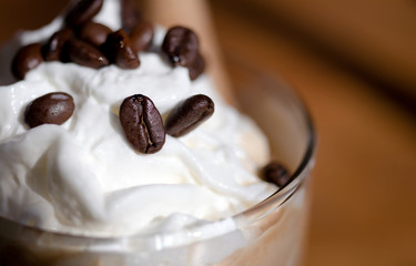 Coffee beans are decorate exquisite dessert of ice cream