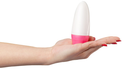 plastic tube for cosmetics in female hand.
