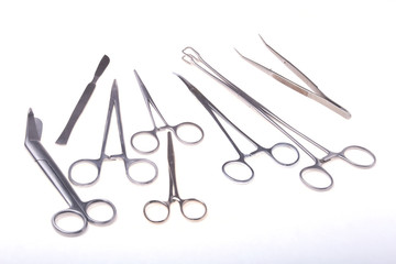 Close Up Surgical instruments and tools on white background. Selective focus.