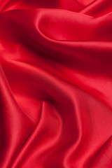 Fototapeta na wymiar Red cloth waves background texture