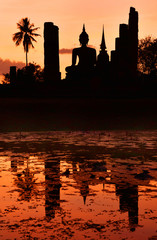 Buddha statue in sunset time. Sukhothai Historical Park, Sukhothai, Thailand.
