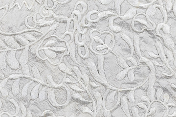 White fabric texture with silhouettes