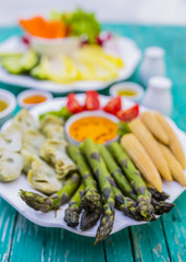 Picnic in the garden and Italian food pinzimonio. Fresh and raw vegetables.