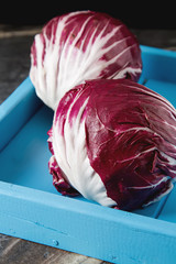 Radicchio on a dark background. Food for a vegan and a vegetarian. Diet, food concept.