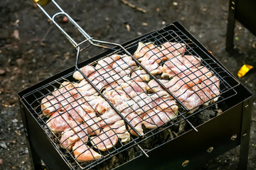 Skewers of chicken or meat fried on a barbecue on the grill, barbecue.