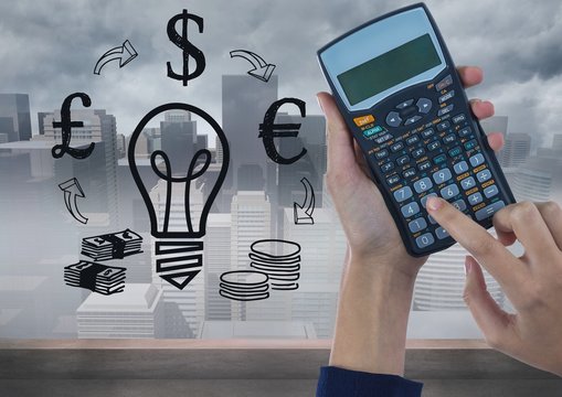 Digital image of cropped hands using calculator 