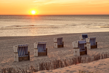 Hörnum, Sylt - beach chairs at North Sea in sunset