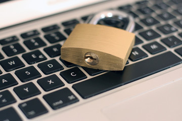 Locked padlock on notebook