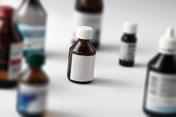 Medications in glass bottles. Medical concept background closeup