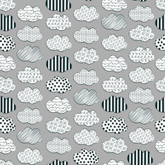 Cute vector black and white cloud pattern. Seamless vector monochrome doodle cloud pattern for fabric, wallpapers, wrapping paper, cards and web backgrounds.