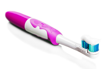 Toothbrush and toothpaste for tooth cleaning isolated on white background