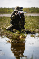 Photo of man with gun