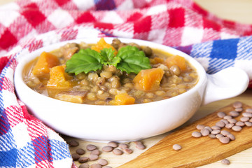 Lentil casserole on rustic table