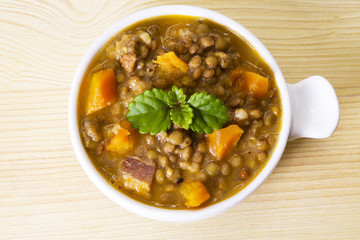 Lentil stew with bacon and carrot