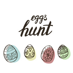 Eggs hunt modern calligraphy and traditional pysanka eggs.