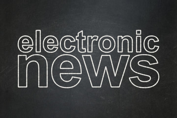 Fototapeta na wymiar News concept: Electronic News on chalkboard background