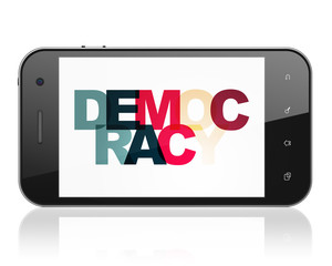 Politics concept: Smartphone with Democracy on  display