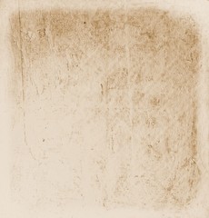 Obraz premium Vintage wall detail in retro style for texture or background. Sepia tones.
