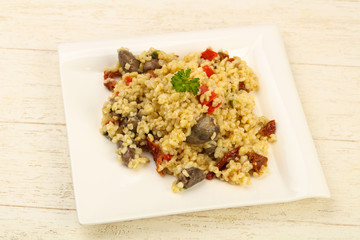 Bulgur with chicken hearts