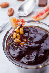 Mousse of chocolate with peanuts and candied fruits