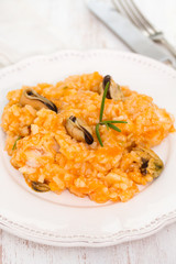 rice with seafood on white plate
