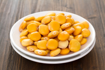 salted lupins on white plate