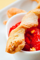 Grissini with salsa spicy sauce