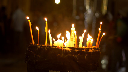 Candles in the Holy Sepulchre Church in Jerusalem