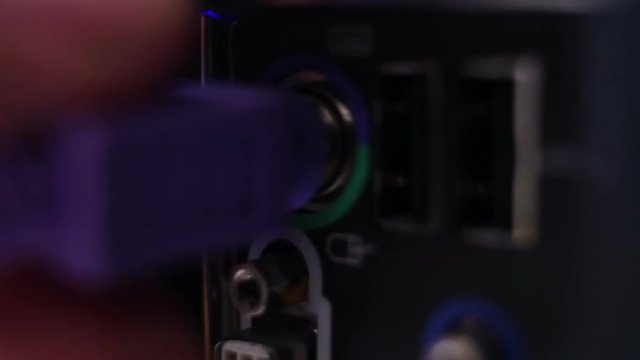 PS/2 connector on motherboard, Hand connects plugs in a PS2, Connecting keyboard and mouse to a computer