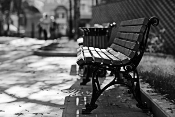 City Trips concept bench in autumn park background