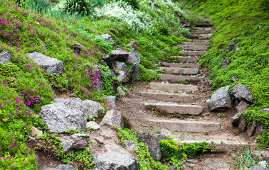 Stony stairs in the green garden