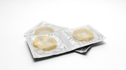 Condoms pack on a white background