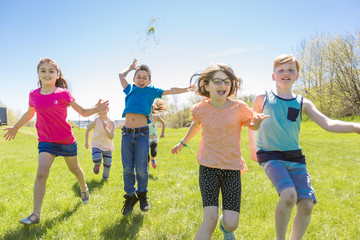 Group of child have fun on a field
