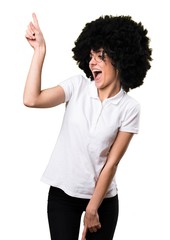 Young afro girl dancing