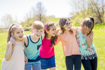 Group of child have fun on a field