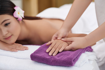 Obraz na płótnie Canvas Enjoying Hand Massage in Beauty Salon