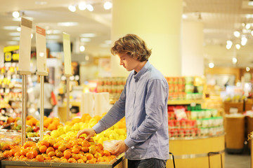 Buying vegetables at the market.