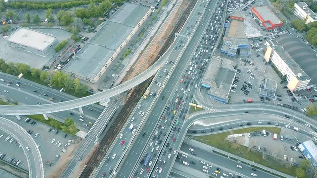 Aerial time lapse. Traffic jam on a car road in the rush hour. 4K video