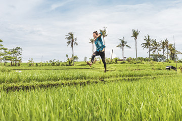 Freerunning in rice fields in Canggu, Bali