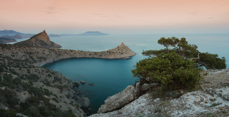 Kind on the cape of Kapchik and Blue bay